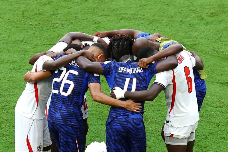 Unity in Rivalry: England and France Players Share a Moment After World Cup Clash